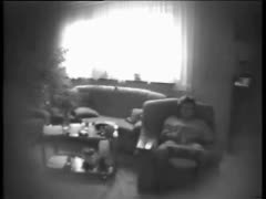 Voyeur using a covert camera in the living room to film a gorgeous wife masturbating